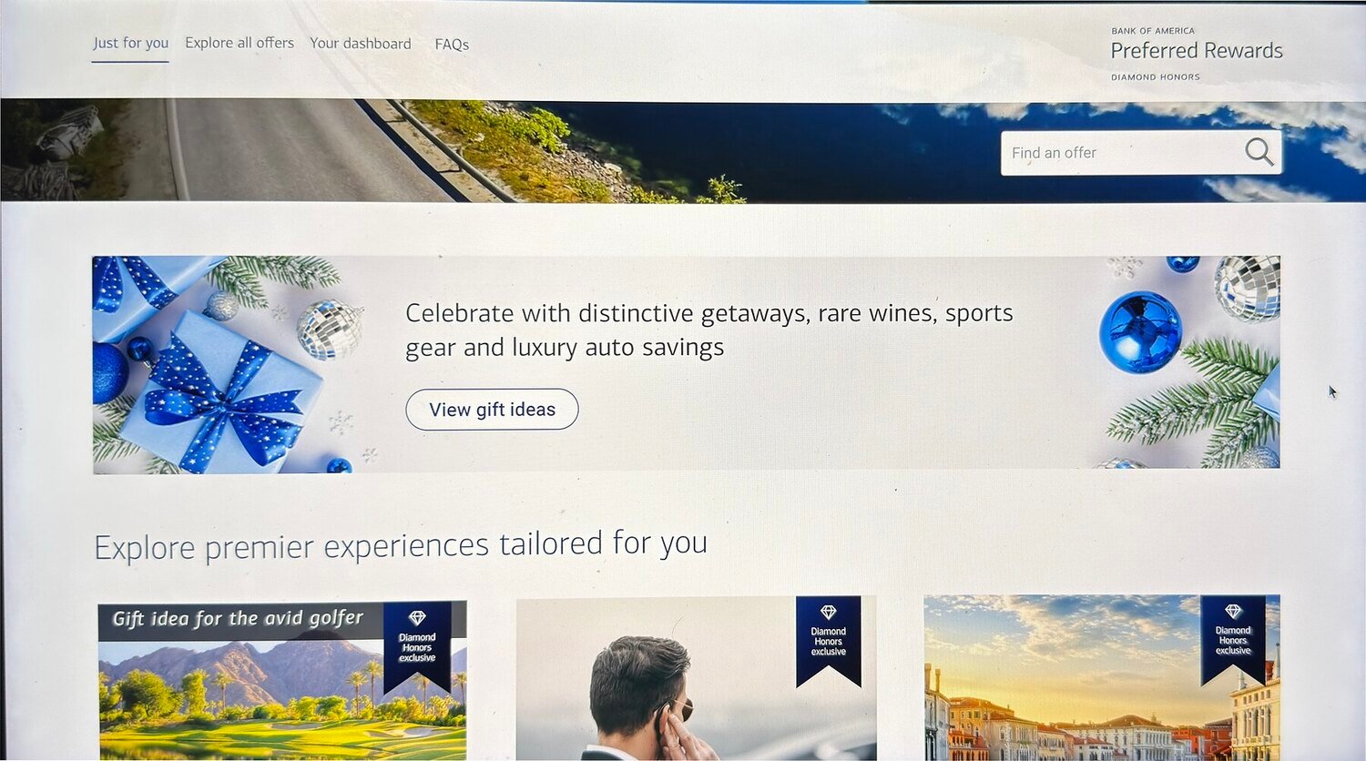 The holiday banner in place on the desktop page, between the masthead and the offer grid
